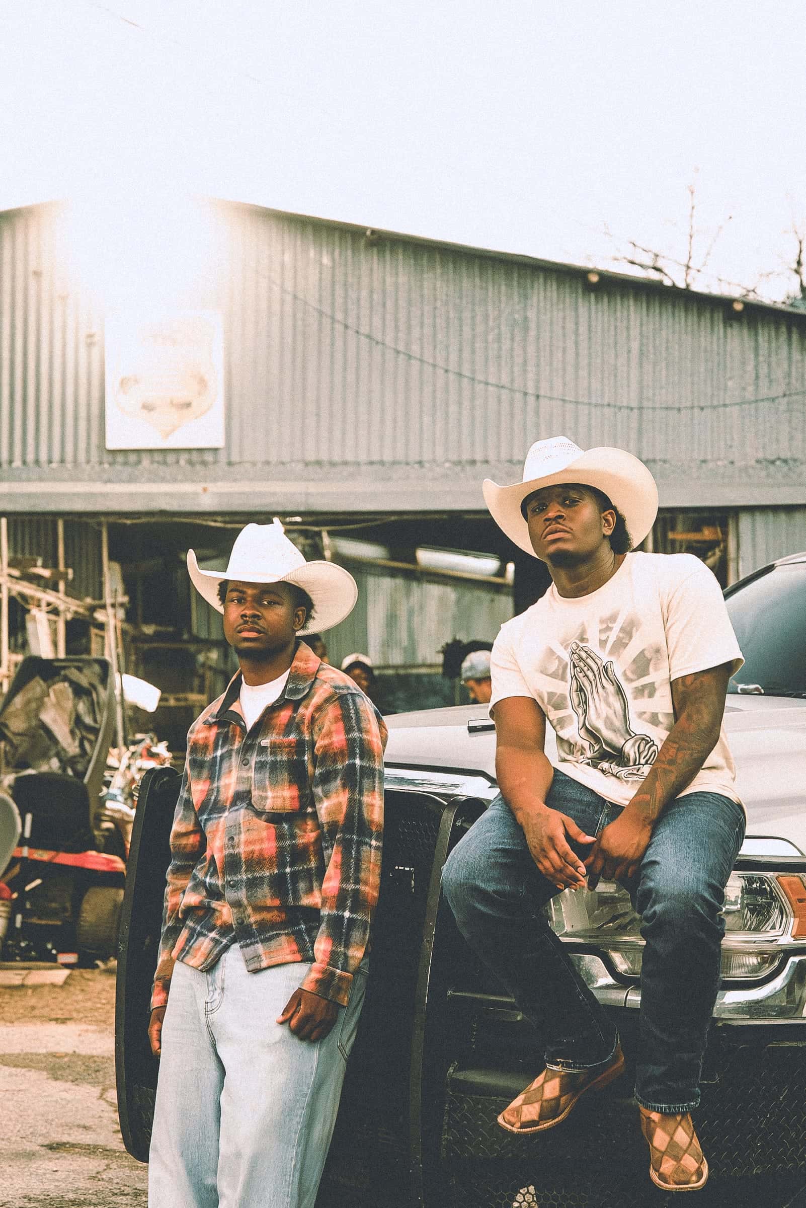 With collaborator — truck and workshop